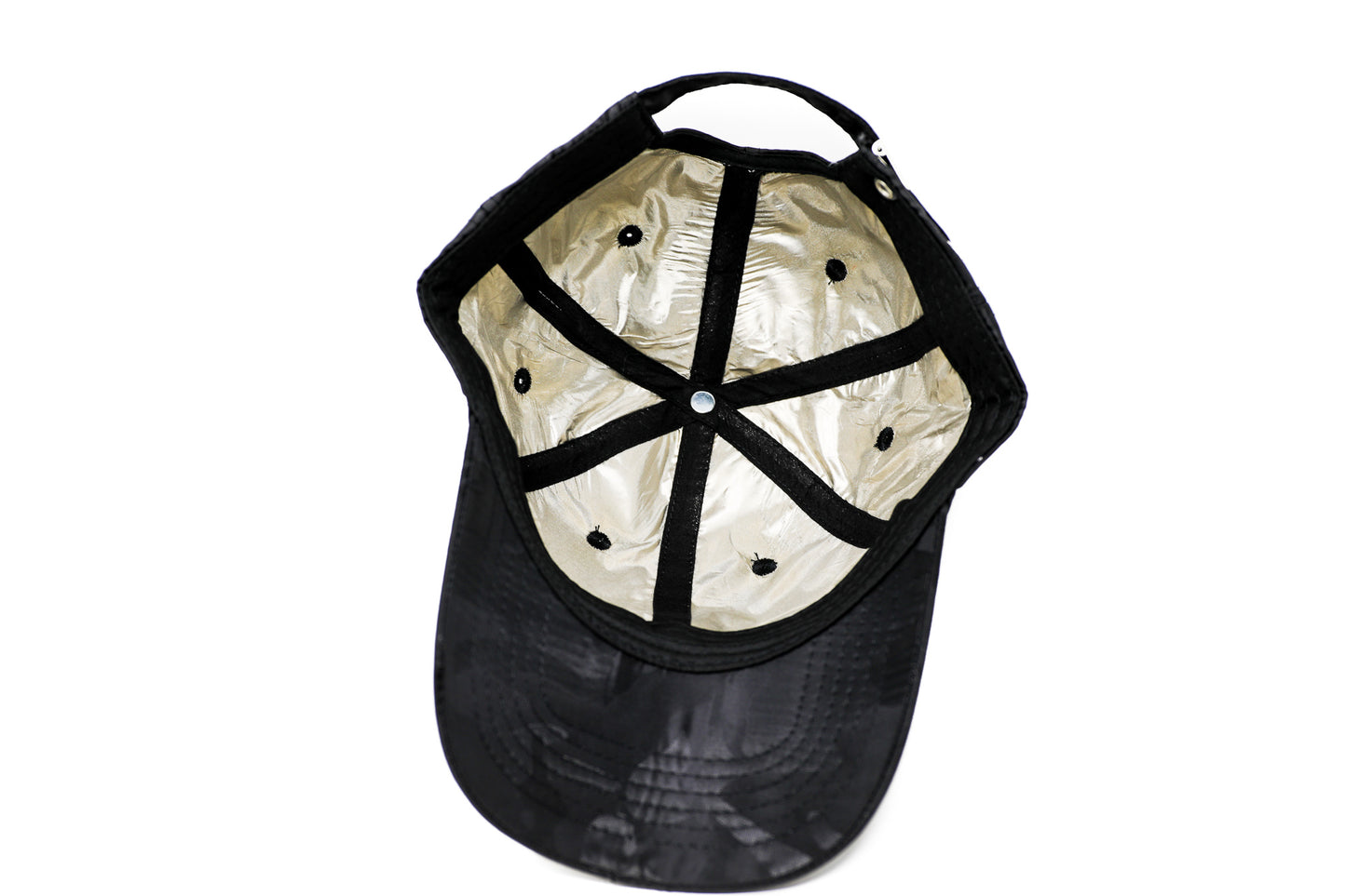 
                  
                    EMF PROTECTION  - Photo of Blushield black camo low radiation cap, underside showing silver lined cap
                  
                