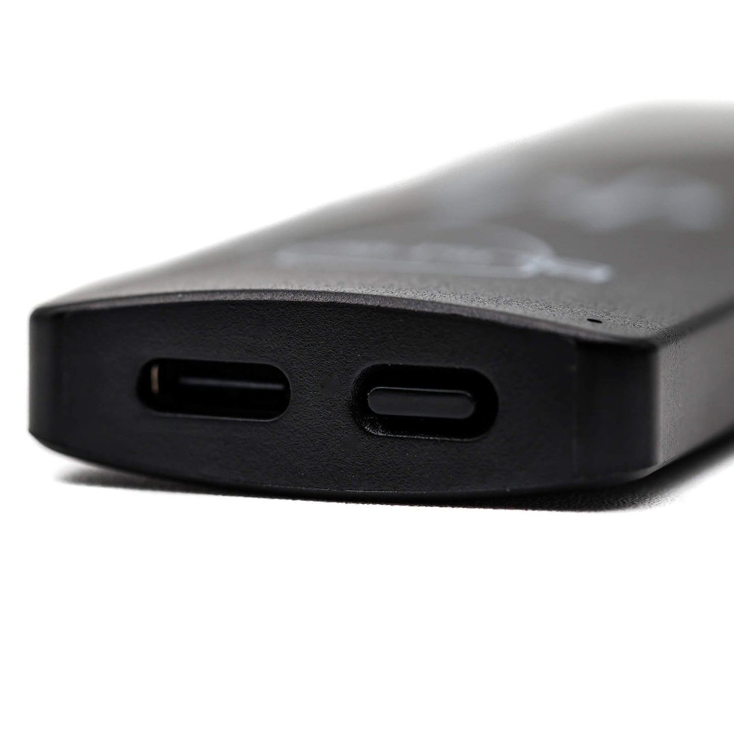 
                  
                    A close look of the button and charging port of the Phi 1 portable 
                  
                