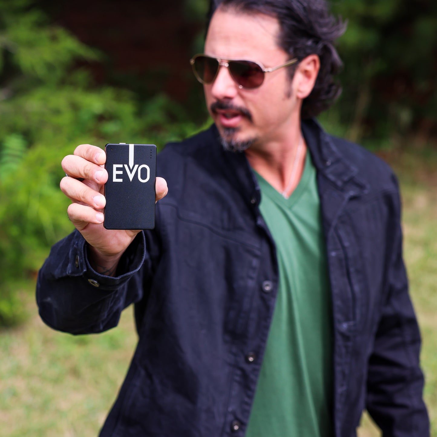
                  
                    A man holds the Blushield Evo portable in his hand
                  
                