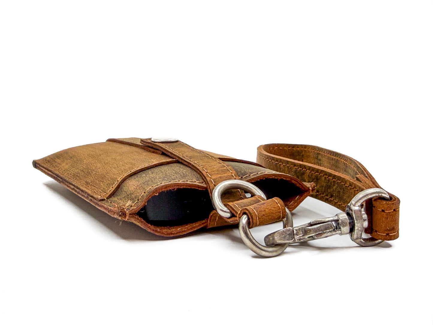 
                  
                    An up close view of Blushield's brown leather pouch that protects the larger portable devices
                  
                