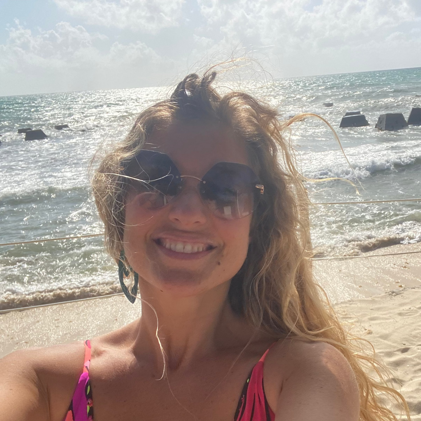 A selfie from the beach submitted by a happy Blushield user