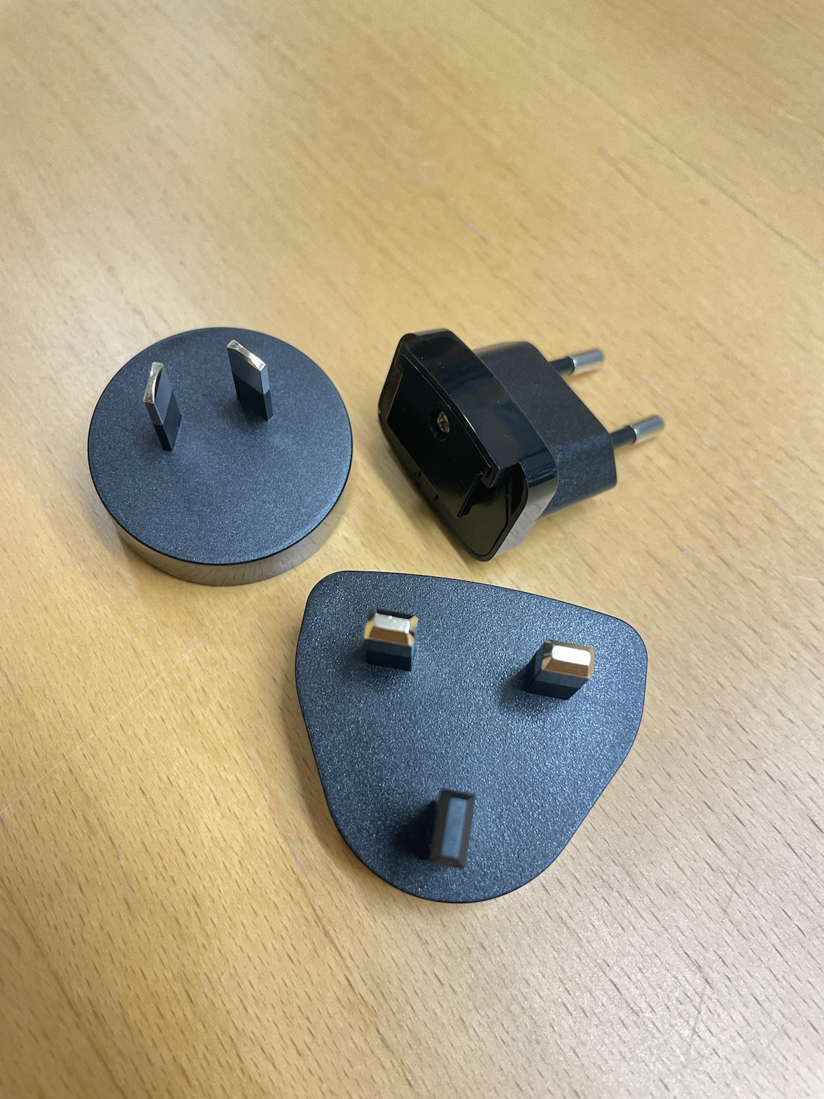 
                  
                    Photo of international plug converters, black
                  
                