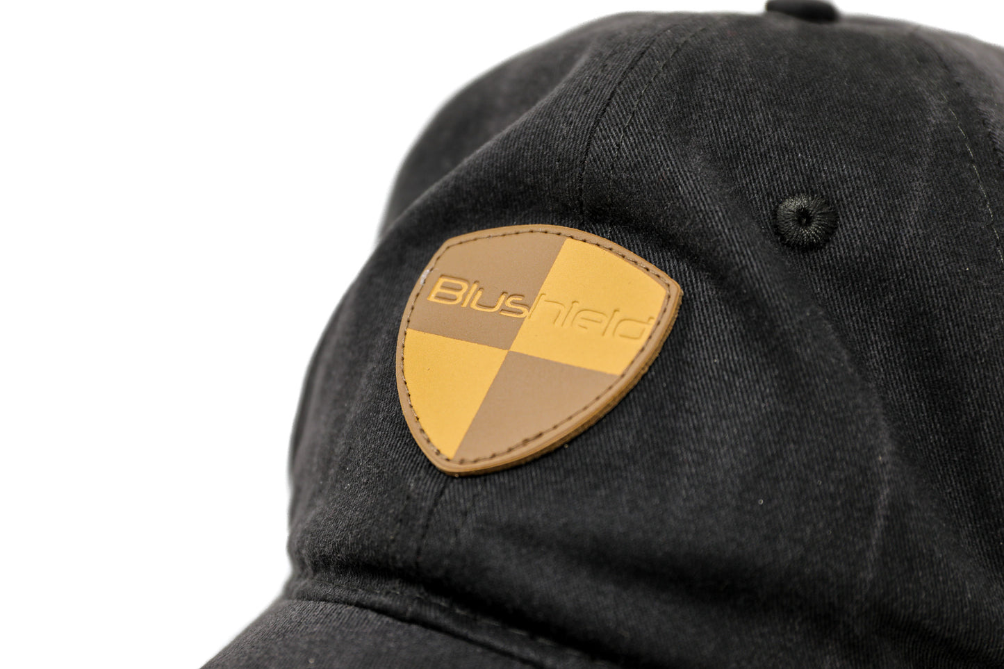 
                  
                    EMF PROTECTION  - Photo of Blushield Low Radiation Cap, Black, closeup of logo on front
                  
                