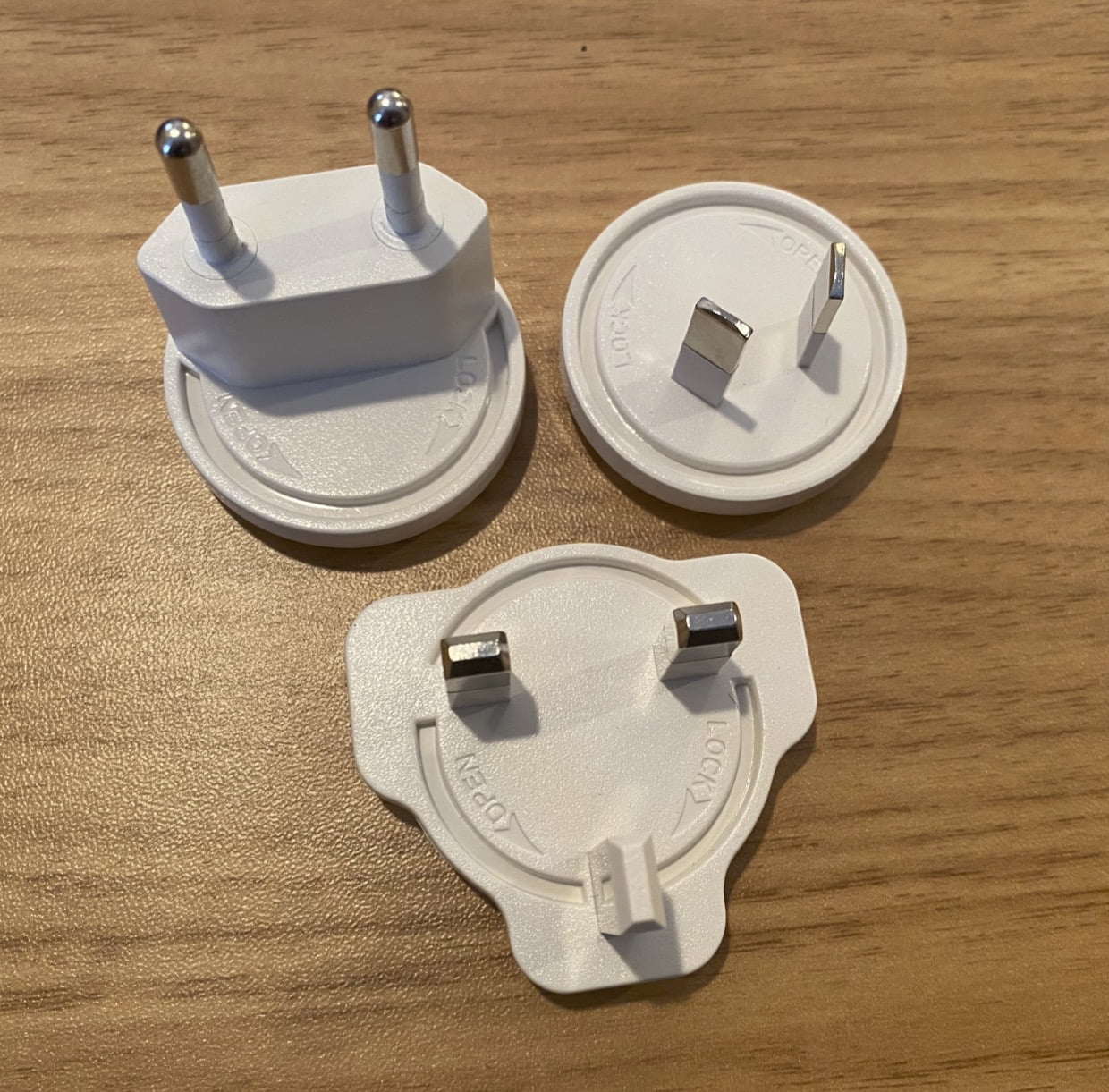 
                  
                    Photo of international plug adapters, white
                  
                